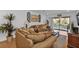 Living room with canal view and comfortable seating at 1352 Rock Dove Ct # B204, Punta Gorda, FL 33950
