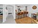 Kitchen with breakfast bar and view down hallway at 1352 Rock Dove Ct # B204, Punta Gorda, FL 33950