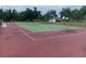 Community tennis court provides recreation opportunity at 22375 Edgewater Dr # 125, Punta Gorda, FL 33980