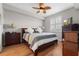 Bright bedroom with a king-size bed and neutral decor at 7607 Grand Estuary Trl # 104, Bradenton, FL 34212