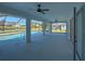 Spacious covered patio with access to a refreshing pool and canal views at 7379 Snow Dr, Englewood, FL 34224