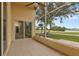 Relaxing screened patio overlooking a lush golf course at 24083 Buckingham Way, Port Charlotte, FL 33980