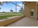 Enjoy the view from this screened patio, overlooking the golf course at 24083 Buckingham Way, Port Charlotte, FL 33980