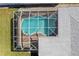 Aerial view of a home with a screened pool at 156 Morgan Se Ln, Port Charlotte, FL 33952