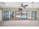 Gathering room with view of the pool and patio at 156 Morgan Se Ln, Port Charlotte, FL 33952