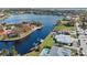 Aerial view of property highlighting its canal-front position at 156 Morgan Se Ln, Port Charlotte, FL 33952