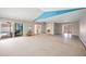 Living room with access to the kitchen and pool area at 156 Morgan Se Ln, Port Charlotte, FL 33952