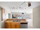 Kitchen with island, double sink, stainless steel dishwasher, and pool view at 156 Morgan Se Ln, Port Charlotte, FL 33952