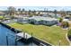 Aerial view of waterfront home with private dock at 156 Morgan Se Ln, Port Charlotte, FL 33952