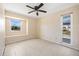 Bedroom with window seat, ceiling fan, and light walls at 156 Morgan Se Ln, Port Charlotte, FL 33952