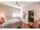 Bedroom with a queen bed and ensuite bathroom access at 1209 San Mateo Dr, Punta Gorda, FL 33950