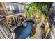 Expansive pool with surrounding patio and tropical plants at 1209 San Mateo Dr, Punta Gorda, FL 33950