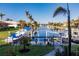 Scenic canal view with private boat dock and lush landscaping at 1209 San Mateo Dr, Punta Gorda, FL 33950