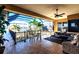 Covered lanai with comfortable seating and a view at 1209 San Mateo Dr, Punta Gorda, FL 33950