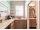 Wet bar with granite countertops and glass shelving at 1209 San Mateo Dr, Punta Gorda, FL 33950
