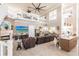 Open concept living room with high ceilings and kitchen at 1209 San Mateo Dr, Punta Gorda, FL 33950