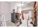 Garage with refrigerator, shelving, and ample storage space at 1209 San Mateo Dr, Punta Gorda, FL 33950