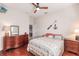 Guest bedroom with a queen bed and dresser at 1209 San Mateo Dr, Punta Gorda, FL 33950