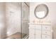 Modern bathroom with walk-in shower, vanity and tile floor at 1209 San Mateo Dr, Punta Gorda, FL 33950