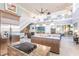 Open kitchen with island, stainless steel appliances, and view of living room at 1209 San Mateo Dr, Punta Gorda, FL 33950