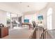 Home office with two monitors, desk, and views of the outdoors at 1209 San Mateo Dr, Punta Gorda, FL 33950