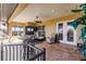 Relaxing lanai with tiled floor, seating area, and French doors at 1209 San Mateo Dr, Punta Gorda, FL 33950