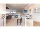 Upstairs game room with wet bar, seating area, and dining table at 1209 San Mateo Dr, Punta Gorda, FL 33950
