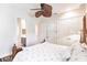 Guest bedroom with ensuite bathroom access and a ceiling fan at 1209 San Mateo Dr, Punta Gorda, FL 33950