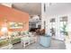 Open living area with high ceilings and a view of the kitchen at 1209 San Mateo Dr, Punta Gorda, FL 33950