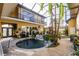 Relaxing pool and patio with tropical landscaping at 1209 San Mateo Dr, Punta Gorda, FL 33950