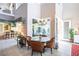 Bright breakfast nook with glass-top table and view of pool at 1209 San Mateo Dr, Punta Gorda, FL 33950