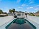 Refreshing pool with view of home and yard at 3833 Lorton Ave, North Port, FL 34286