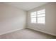 Spacious bedroom with neutral walls and carpet, featuring a window at 16024 Crofton Springs Way, Port Charlotte, FL 33953