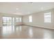 Spacious dining area with tile floors and access to backyard at 16024 Crofton Springs Way, Port Charlotte, FL 33953