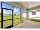 Screened porch with paver floor overlooking backyard at 16024 Crofton Springs Way, Port Charlotte, FL 33953
