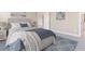 Comfortable main bedroom with a plush bed, soft lighting, and an en-suite bathroom at 25228 Rampart Blvd, Punta Gorda, FL 33983