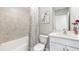 Bathroom featuring a shower-tub combination with stylish finishes at 25236 Rampart Blvd, Punta Gorda, FL 33983