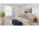 Comfortable bedroom featuring soft hues, carpet, and a tranquil ambiance at 25236 Rampart Blvd, Punta Gorda, FL 33983