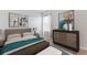 Stylish bedroom with calm decor, creating a peaceful and cozy environment at 25236 Rampart Blvd, Punta Gorda, FL 33983