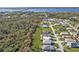 Aerial view of a coastal neighborhood with lush greenery and waterways at 4255 Oak Terrace Cir, Port Charlotte, FL 33953