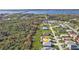 Neighborhood aerial view featuring single-Gathering homes and a view of the inter-coastal waterway at 4255 Oak Terrace Cir, Port Charlotte, FL 33953
