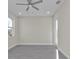 Unfurnished bedroom with luxury vinyl flooring and white trim throughout at 4255 Oak Terrace Cir, Port Charlotte, FL 33953
