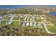 Aerial view of the community, showcasing its proximity to lakes and green spaces at 4255 Oak Terrace Cir, Port Charlotte, FL 33953