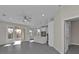 Open living area with patio doors and view of the kitchen at 4255 Oak Terrace Cir, Port Charlotte, FL 33953
