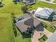 Aerial view of the property, showcasing the home's layout, pool area, and well-maintained landscaping at 7417 S Blue Sage, Punta Gorda, FL 33955