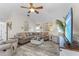 Inviting living room with cozy seating, stylish decor, and plenty of room for relaxing and entertaining at 7417 S Blue Sage, Punta Gorda, FL 33955