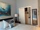 Bedroom with large closet and patterned bedding at 8647 Lake Front Ct, Punta Gorda, FL 33950