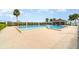 Inviting community pool with a covered seating area at 9011 Midnight Pass Rd # 329, Sarasota, FL 34242