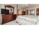 Spacious bedroom with a large bed, dresser, and plenty of natural light at 9011 Midnight Pass Rd # 329, Sarasota, FL 34242