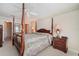 Spacious main bedroom with a comfortable bed and plenty of light at 9011 Midnight Pass Rd # 329, Sarasota, FL 34242